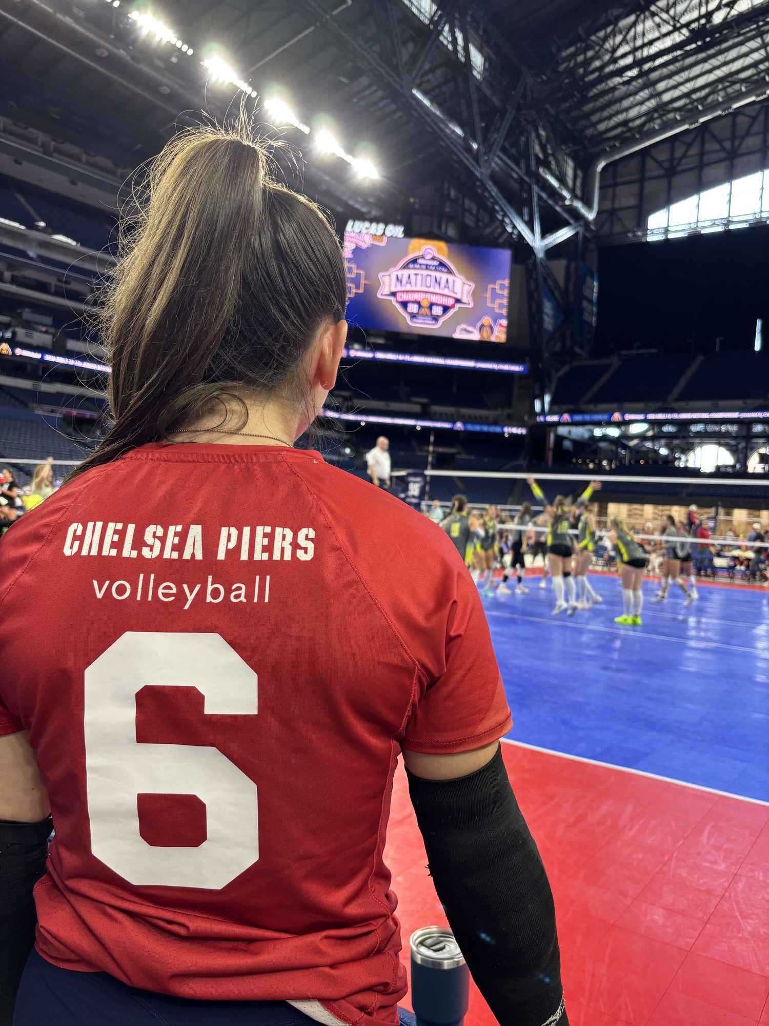Chelsea Piers volleyball, number 6, taking in the arena